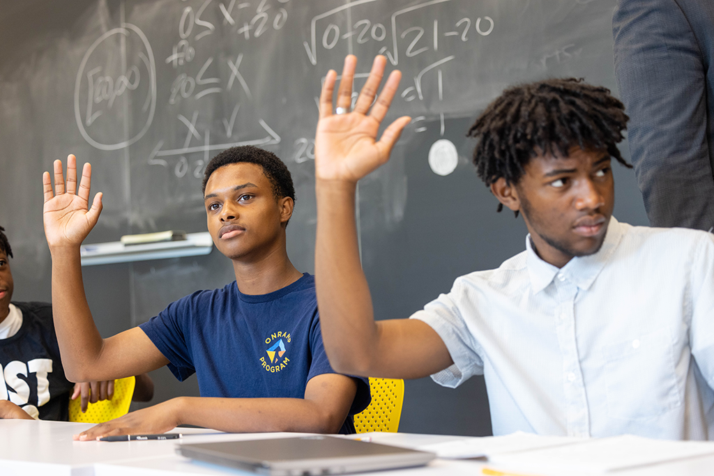 Black Students in Class Room, cover image of white paper